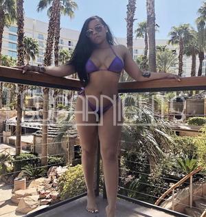 Amber in a purple bikini on a sunny balcony in Houston. Amber in a purple bikini on a sunny balcony in Houston.